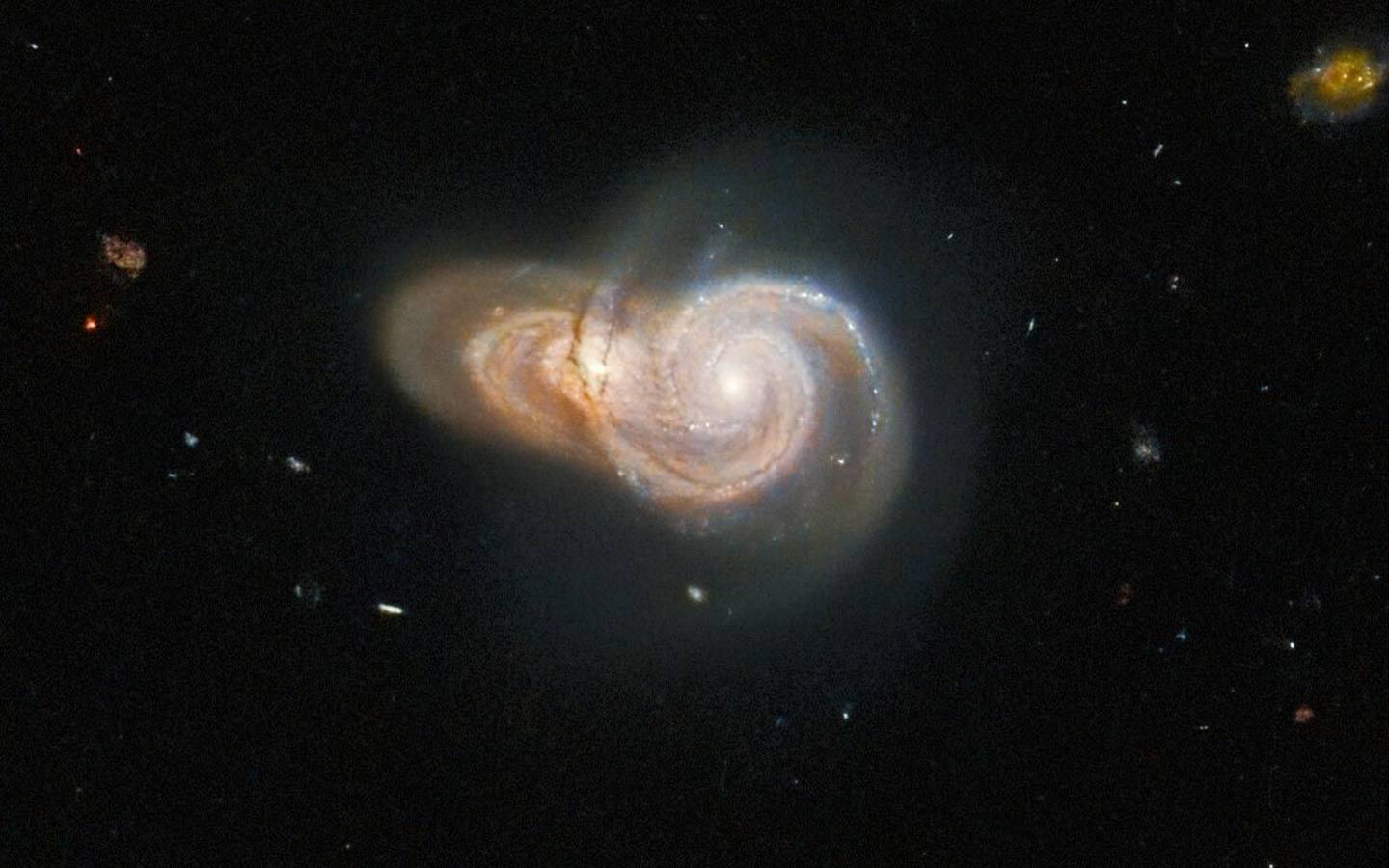 Overlapping galaxies with possible collision past detected by the Hubble telescope