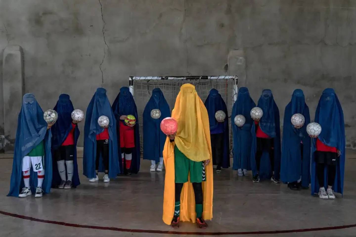 Women's soccer team poses for photographer Ebrahim Noroozi, in Kabul Afghanistan.  Photo: Ebrahim Noroozi Sony World Photography Awards 2023
