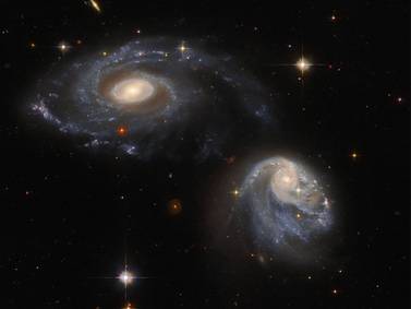 El Hubble de la NASA capta la sorprendente fusión de dos galaxias a 671 millones de años luz de la Tierra